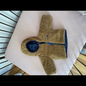 Infant boys reversible north face. Fuzzy mustard color on one side/navy on other